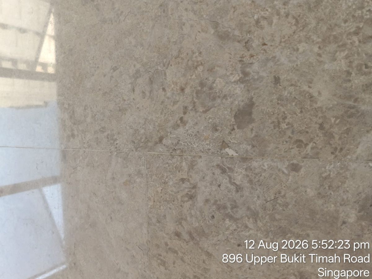 Close-up of beige marble tile joint