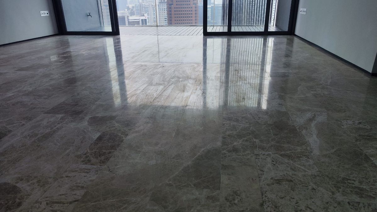 Emperador marble floor reflecting the balcony windows